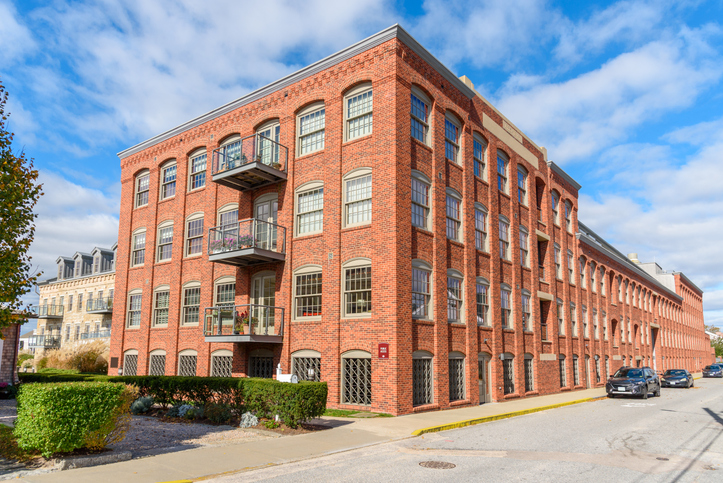 Experienced commercial property owner reviewing 1031 exchange options with an advisor