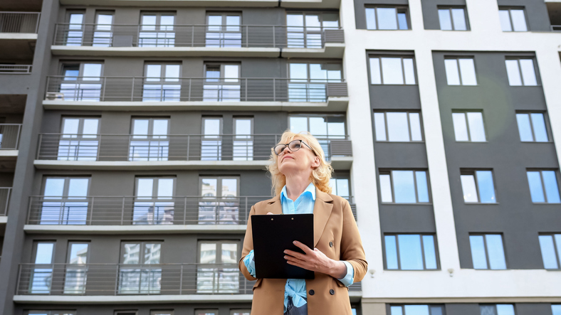 Commercial property being inspected and underwritten before an investment decision.