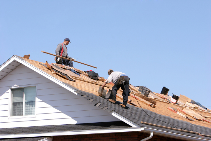 Roof replacement under way on a commercial building