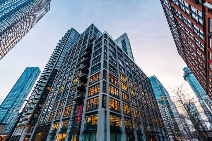 Institutional commercial real estate of the kind held by a REIT following a 721 exchange