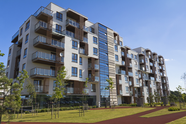 Modern multifamily apartment building of the kind held as institutional real estate.